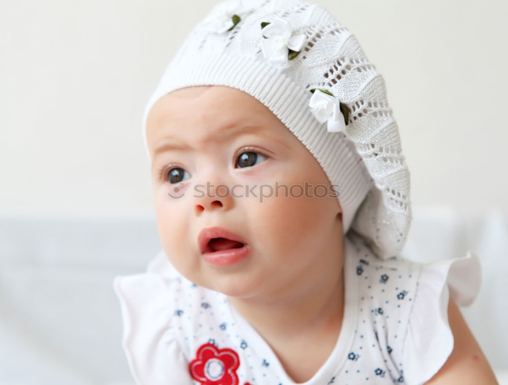 Similar – portrait of a beautiful baby girl at home. Family concept indoor