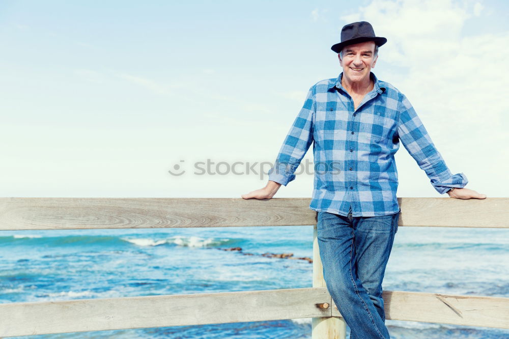 Similar – Man with skateboard at beach