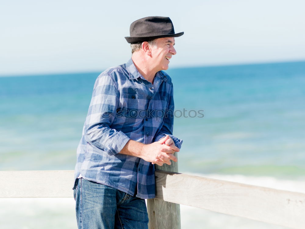 Similar – Man holding hands at seaside