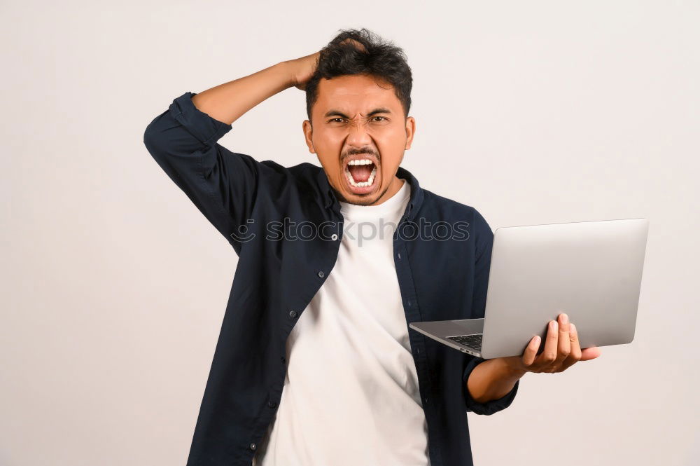 Similar – Man celebrating good news.