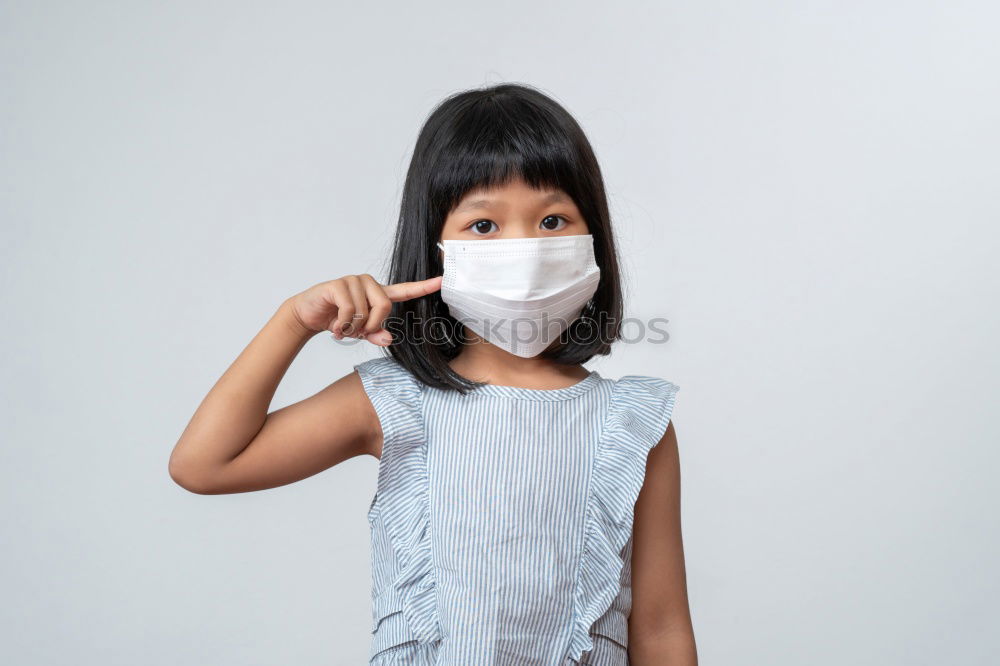Similar – Foto Bild Niedlicher kleiner Junge in medizinischer Maske