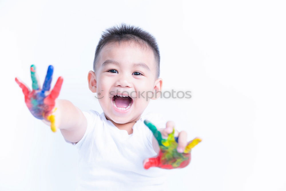 Similar – Happy baby playing with toy blocks.