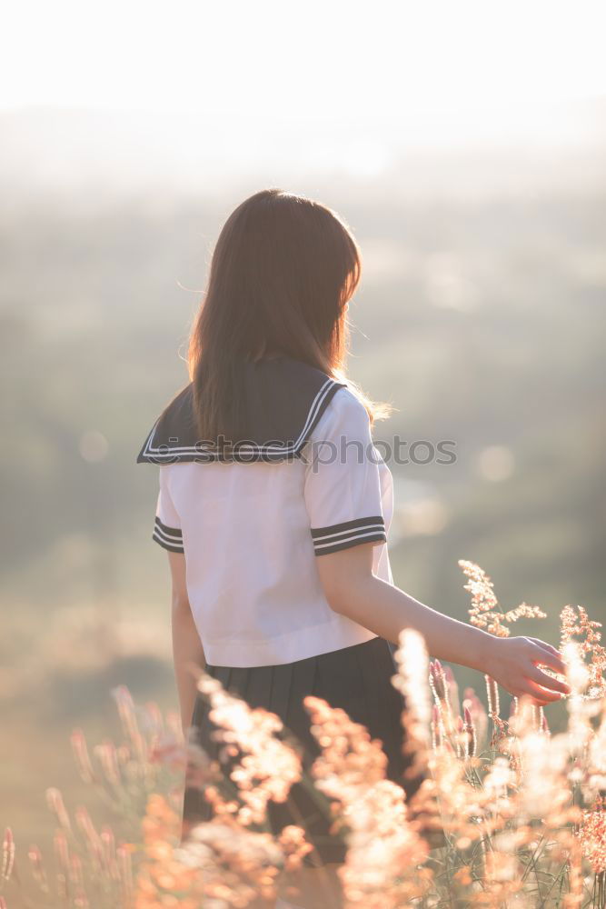 Similar – Woman posing on nature Sit