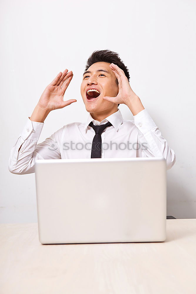 Similar – Man celebrating good news.