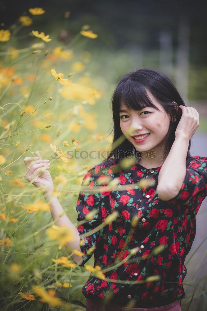 portrait of happy asian girl in nature