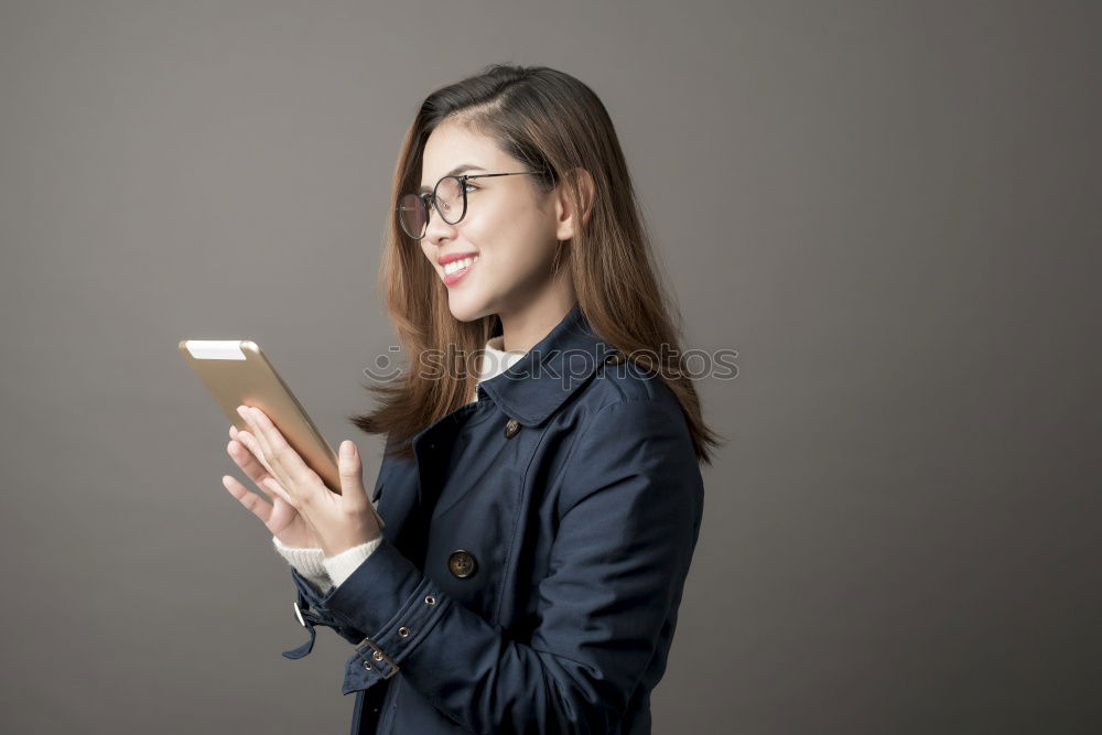 Similar – Image, Stock Photo Young woman looking at her smartphone