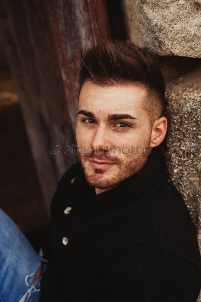 Similar – Image, Stock Photo Man leans against the wall and looks into the distance