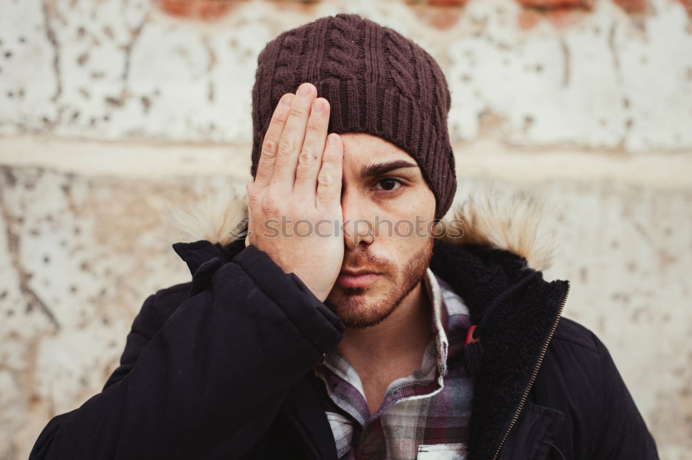 Similar – Image, Stock Photo Handsome man posing on orange wall