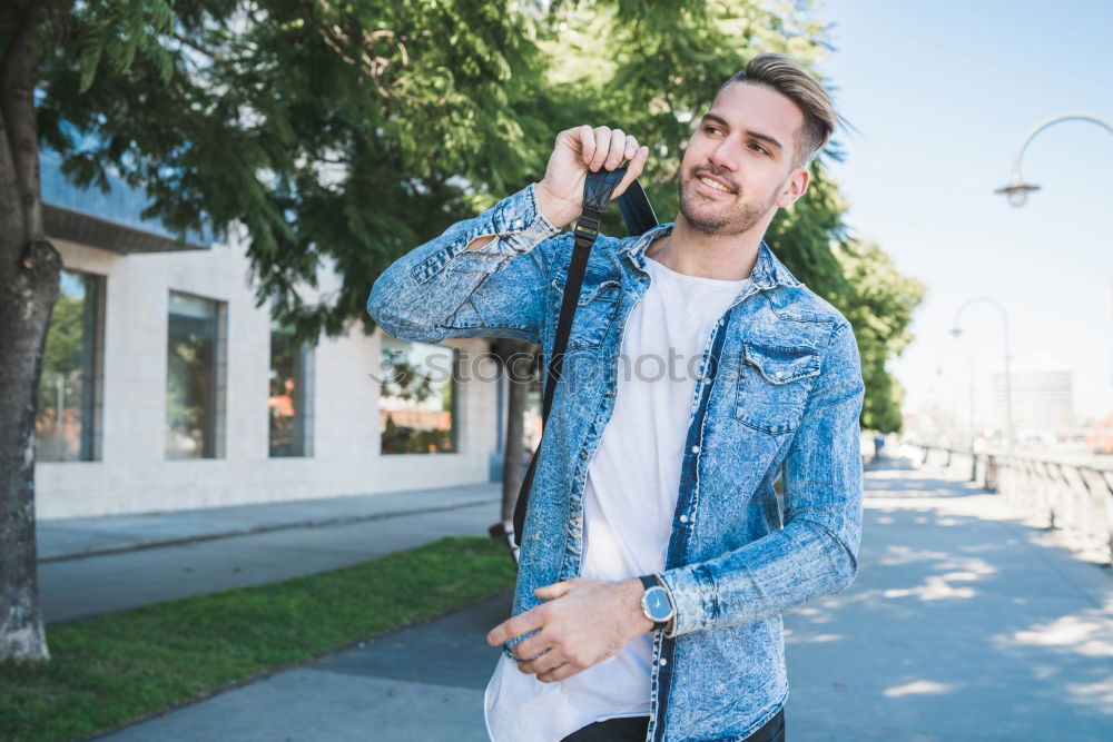 Similar – A long hair male running between the trees during a sunny day in the park with copy space