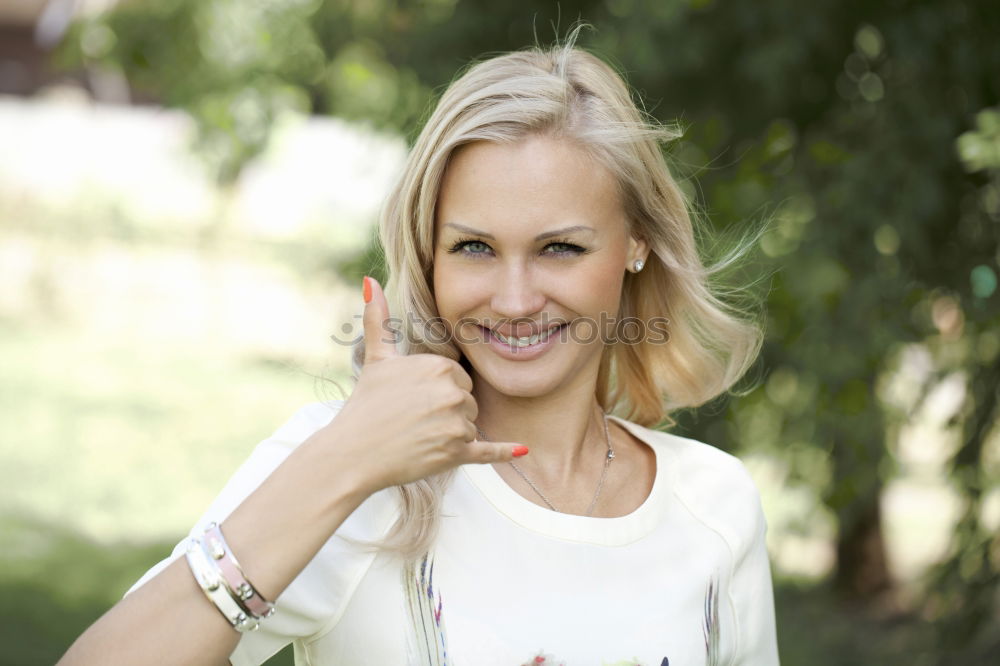 Similar – Image, Stock Photo Blond mature smiling woman on street