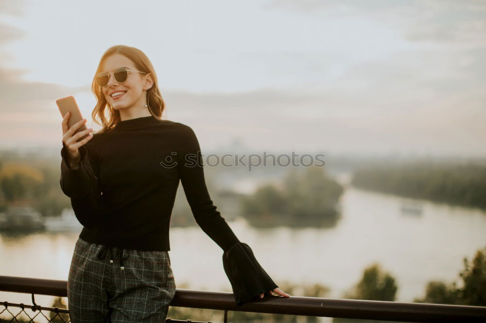 Similar – Image, Stock Photo Young woman is looking at polaroid picture at the beach