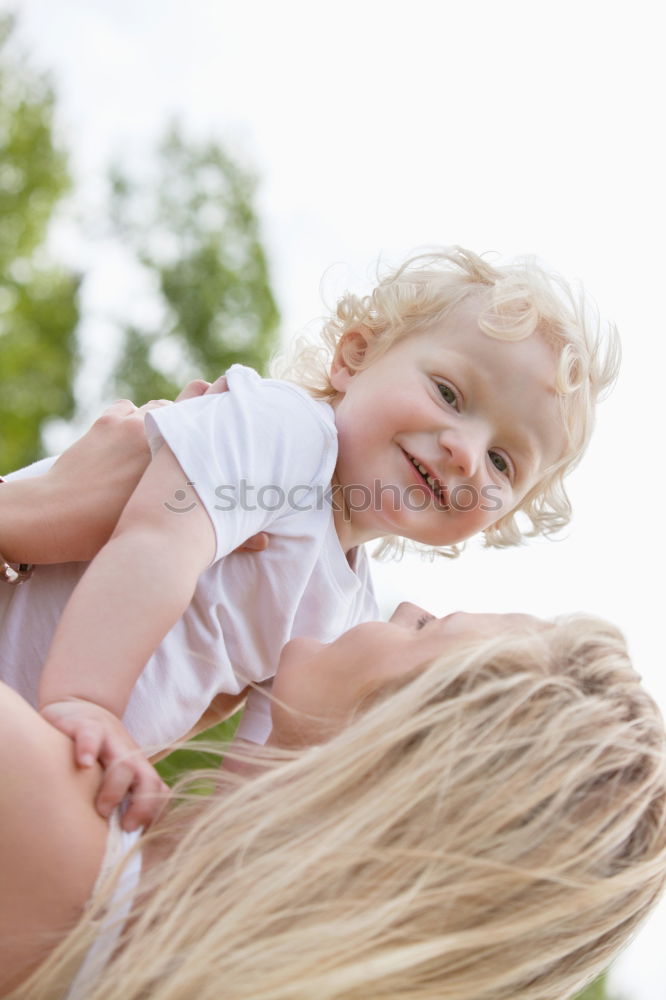 Similar – Image, Stock Photo Mother with child in park