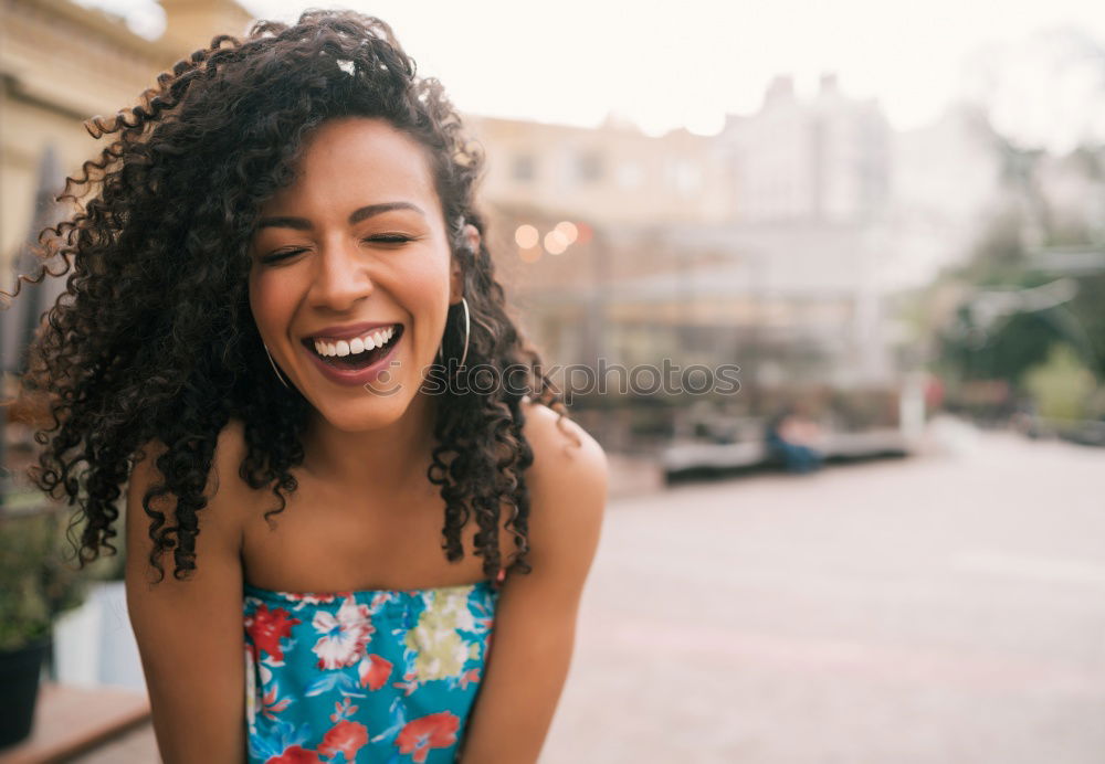 Similar – Image, Stock Photo Happy Arab woman sitting on urban step with a digital tablet