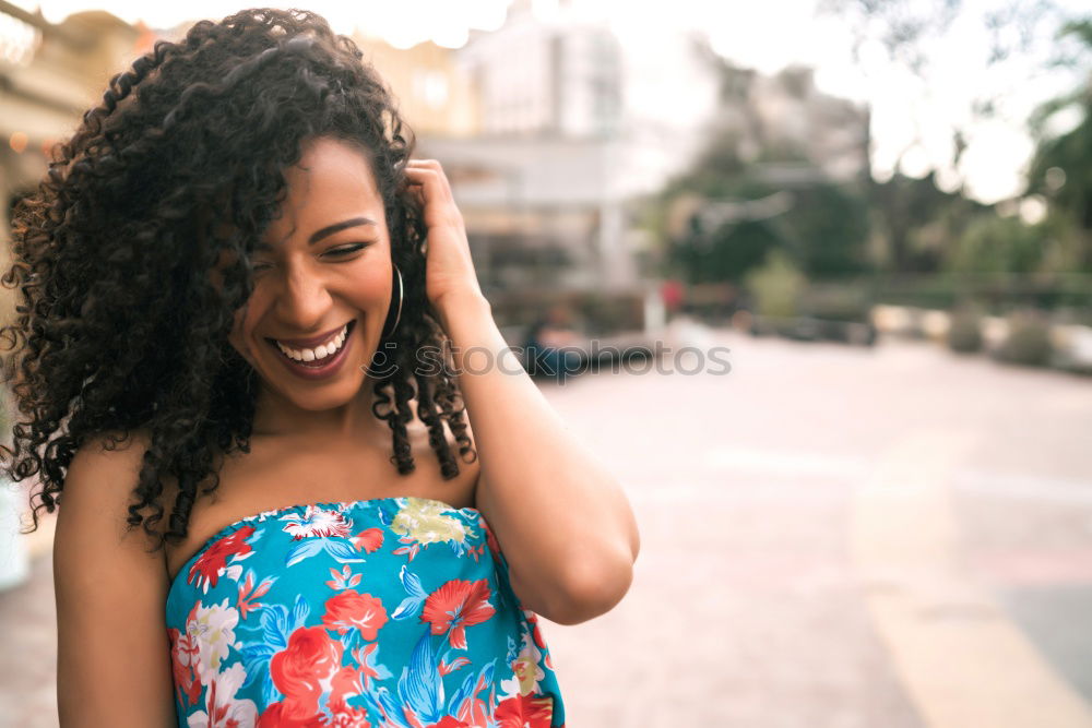 Similar – Smiling young adult woman talking on the phone