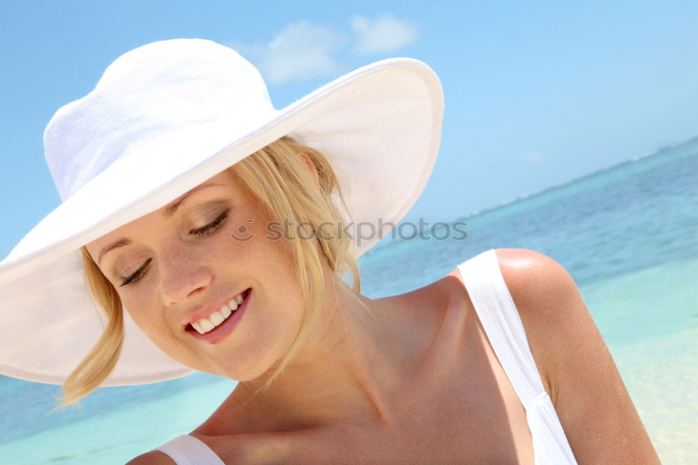 Similar – Young Woman Portrait With White Beach Hat