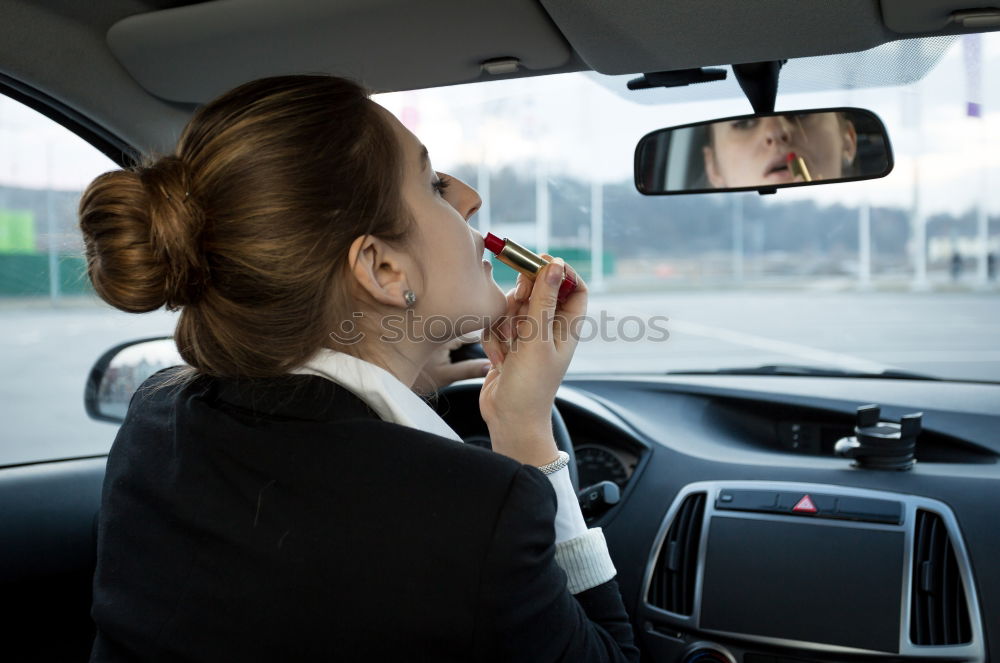 Similar – Taxi driver in a mask with a client on the back seat wearing mask