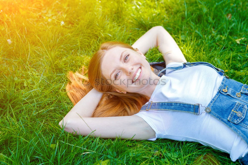 Similar – Image, Stock Photo Confident girl posing in green field