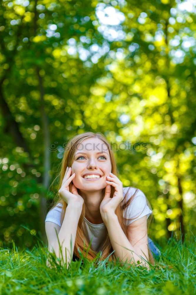 Similar – Image, Stock Photo Blonde girl drinking coffee in park sitting on grass