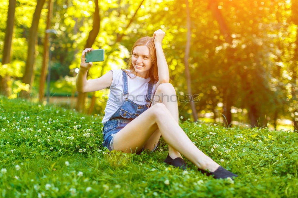 Similar – Image, Stock Photo Smiling young woman using a camera to take photo.