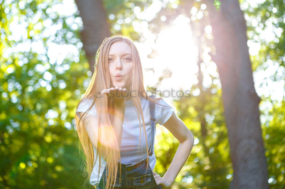 Similar – Image, Stock Photo sports woman doing lawn exercises and stretching on the grass outdoor in a park listening music