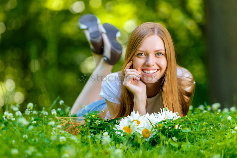 Similar – Image, Stock Photo Smiling young woman using a camera to take photo.