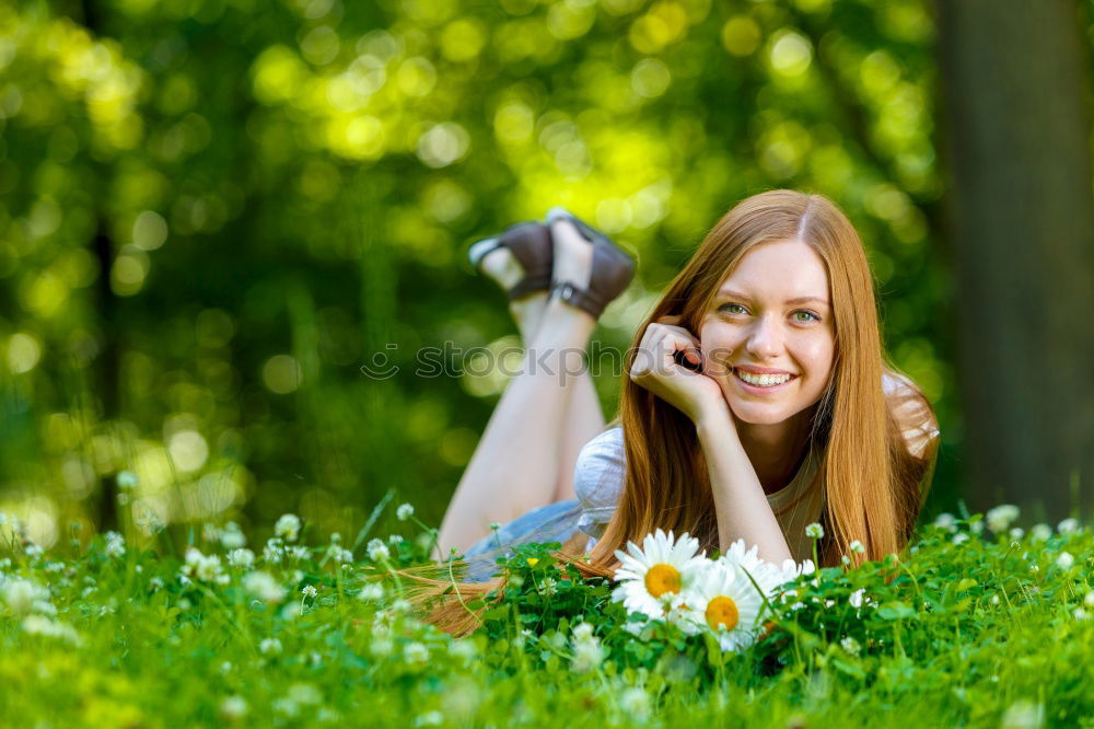 Similar – Image, Stock Photo Smiling young woman using a camera to take photo.