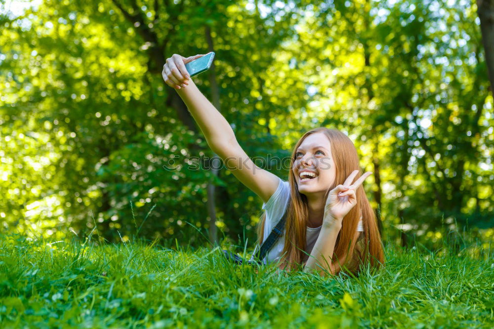 Similar – Image, Stock Photo Blonde girl drinking coffee in park sitting on grass