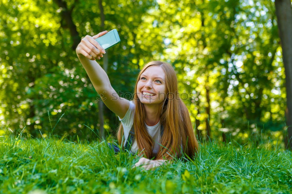 Similar – Image, Stock Photo Blonde girl drinking coffee in park sitting on grass