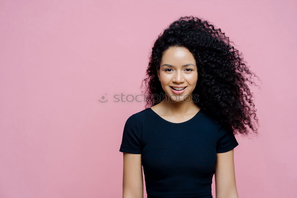 Similar – Image, Stock Photo Mixed woman with afro hairstyle standing in an urban park