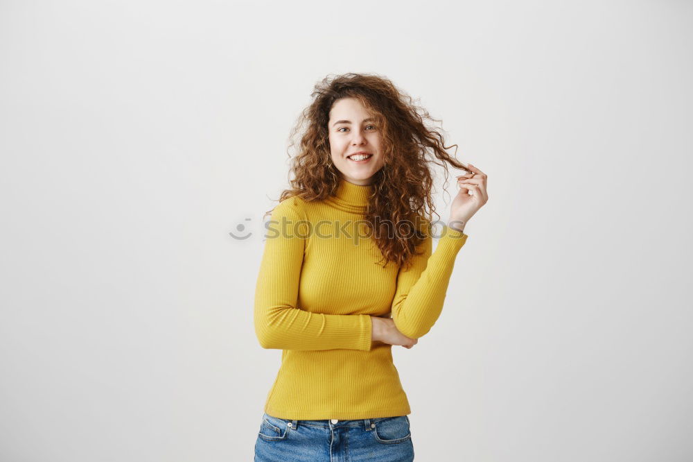 Similar – Cheerful woman in yellow jacket