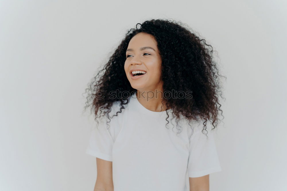 Similar – Young happy woman surrounded by green leaves