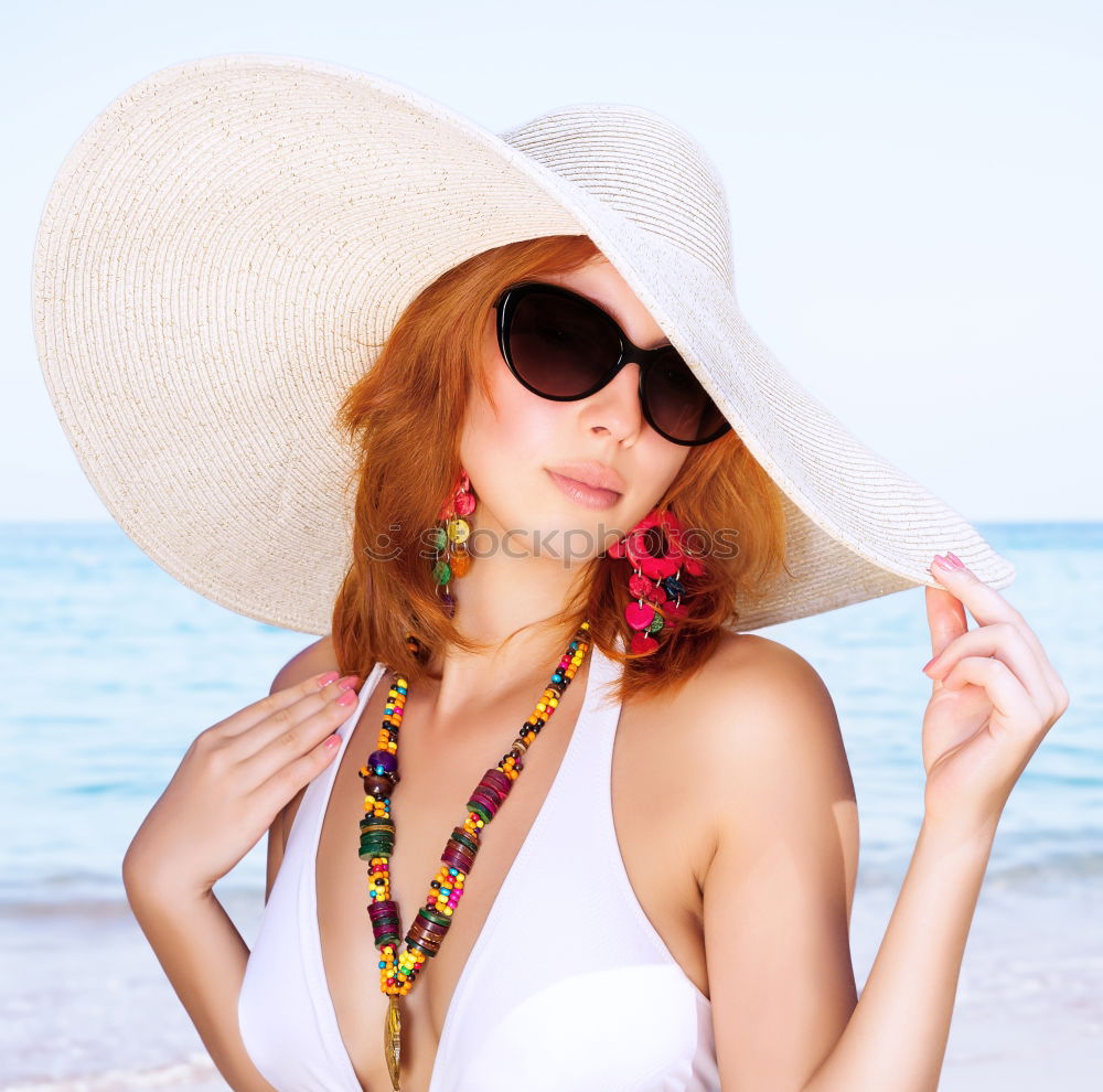 Similar – Redhead model protecting herself from sun