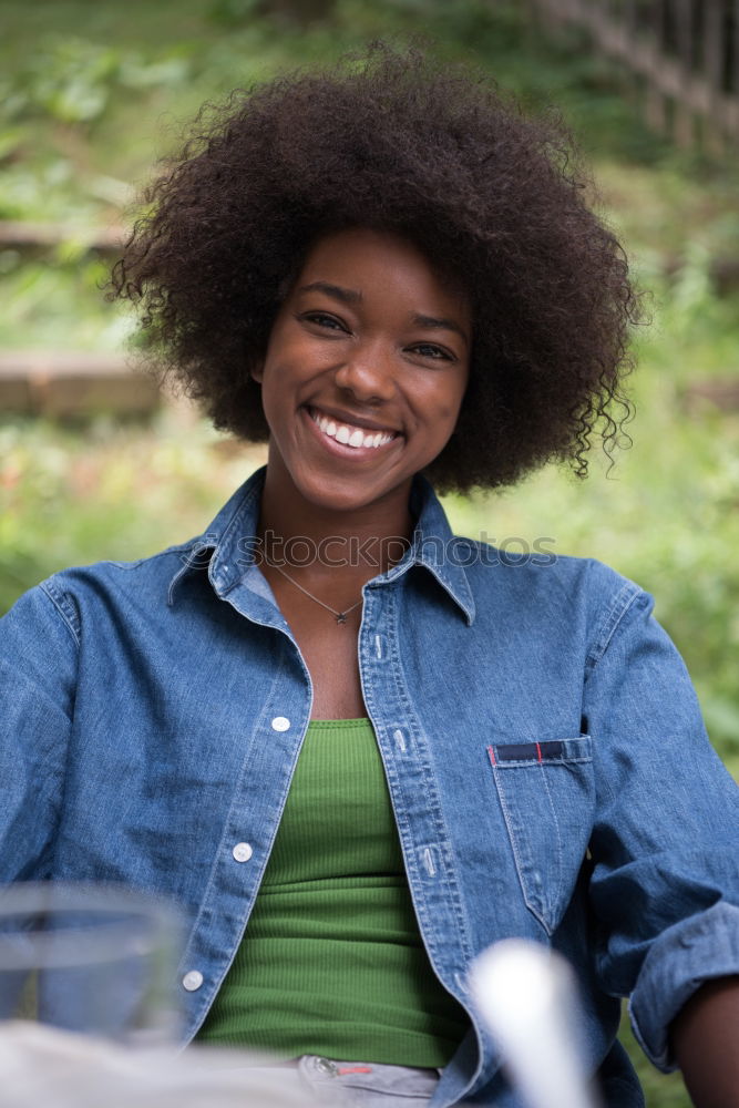 Similar – Image, Stock Photo Woman with afro hair jumping down a slide.