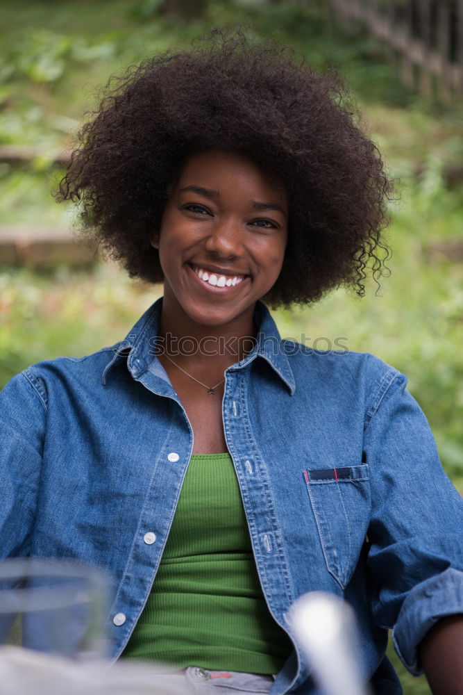Similar – Image, Stock Photo Woman with afro hair jumping down a slide.