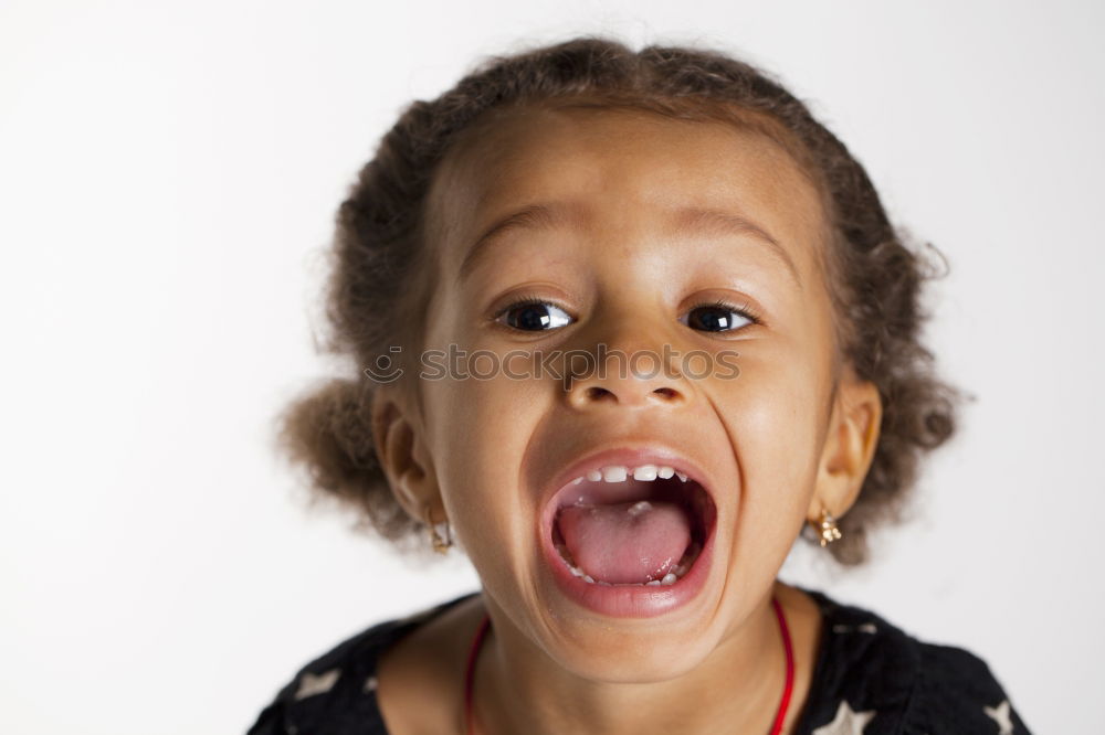 Similar – Young Girl Screaming With Closed Eyes