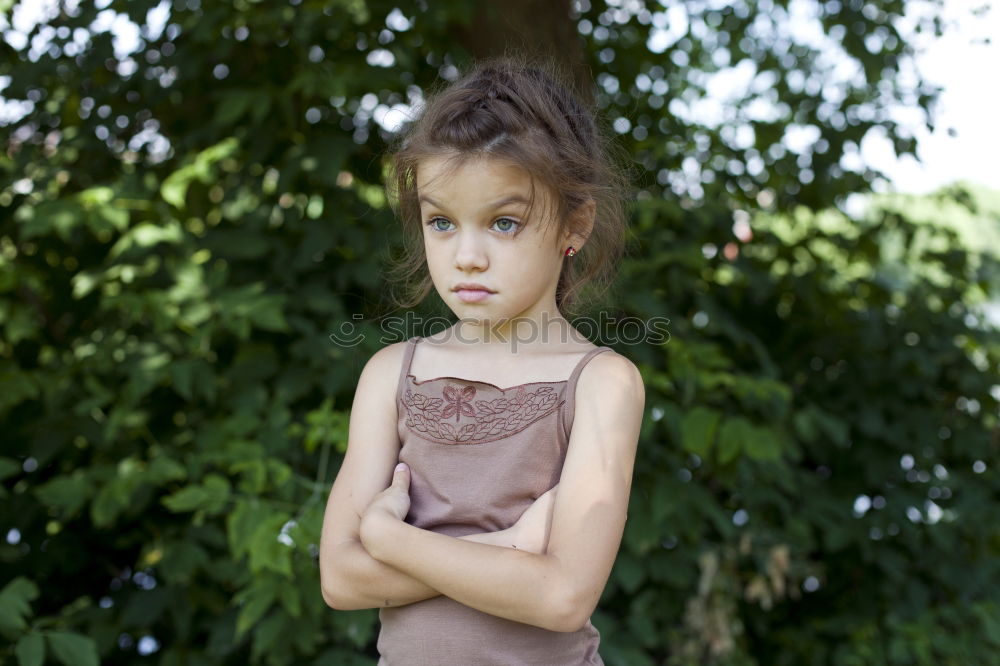 Similar – sad little girl holding toy with her hands