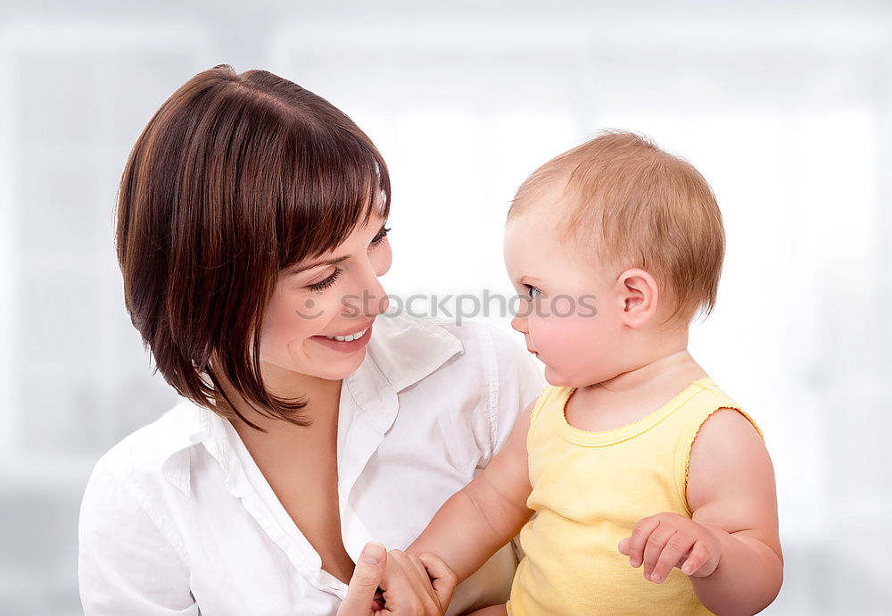 Image, Stock Photo Woman and her cute little daughter are hugging