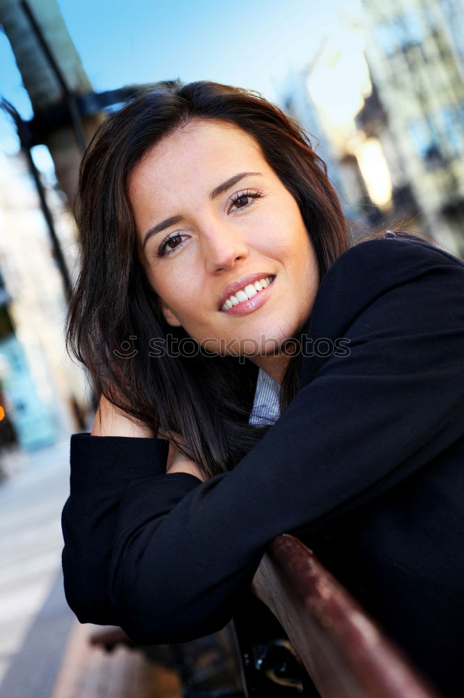 Similar – Young woman wearing casual clothes smiling in urban background