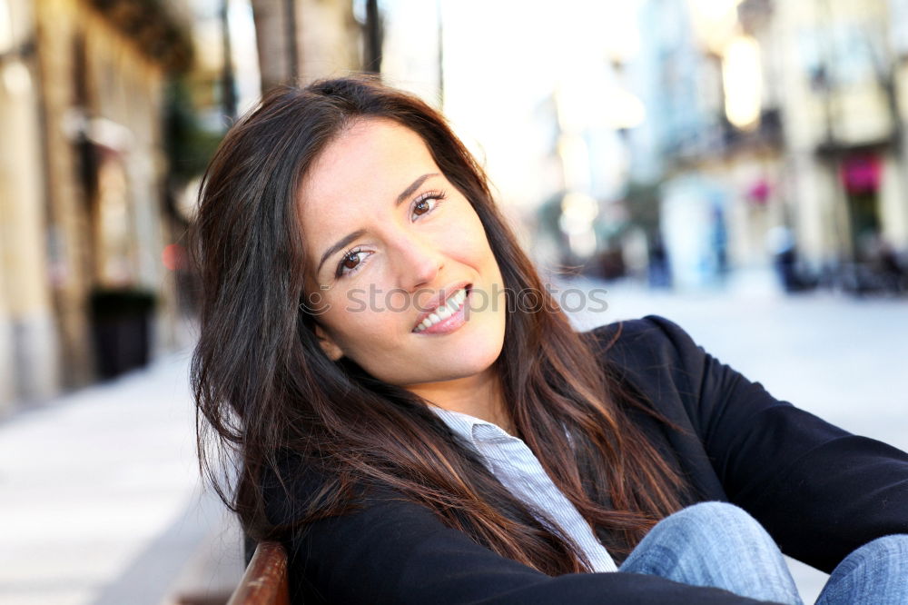 Similar – Mixed woman in urban background wearing casual clothes