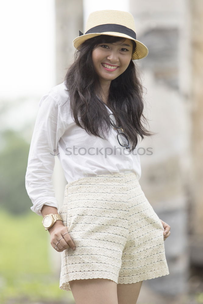 Similar – young woman in urban background wearing casual clothes