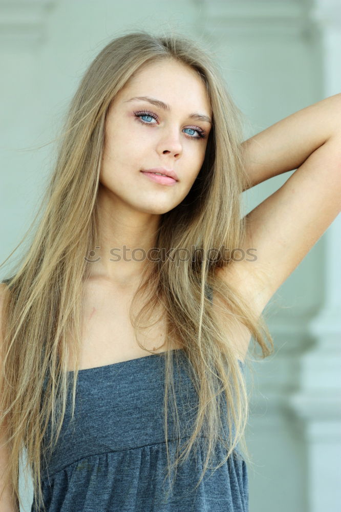 Similar – Smiling young woman in urban background.