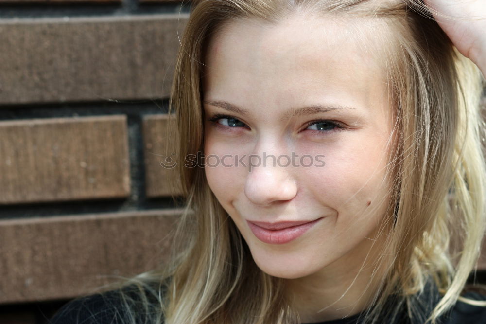 Similar – young blonde woman with ponytail and glasses