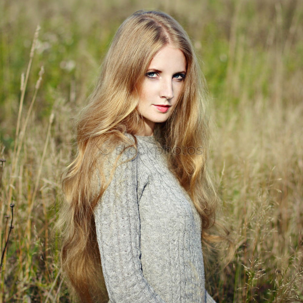 Similar – Pretty happy woman with red long hair