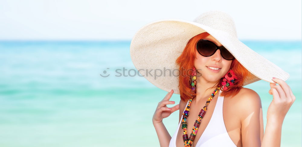 Similar – Redhead model protecting herself from sun