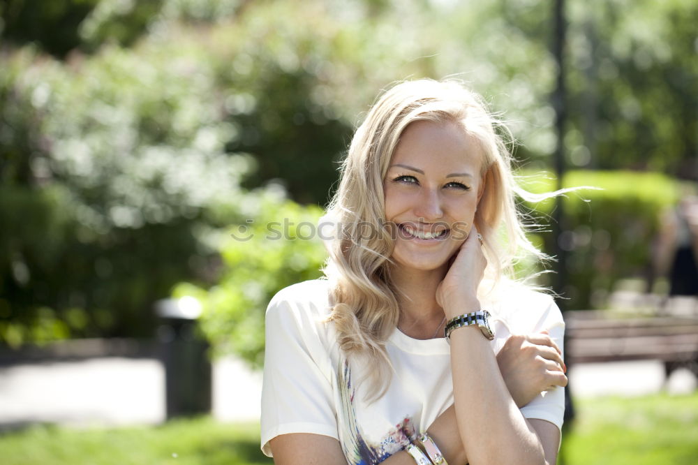 Similar – Smiling young woman in urban background.