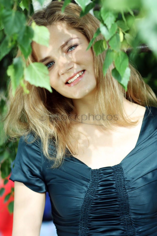 Similar – Young natural woman with freckles and wild curly hair looking at the camera