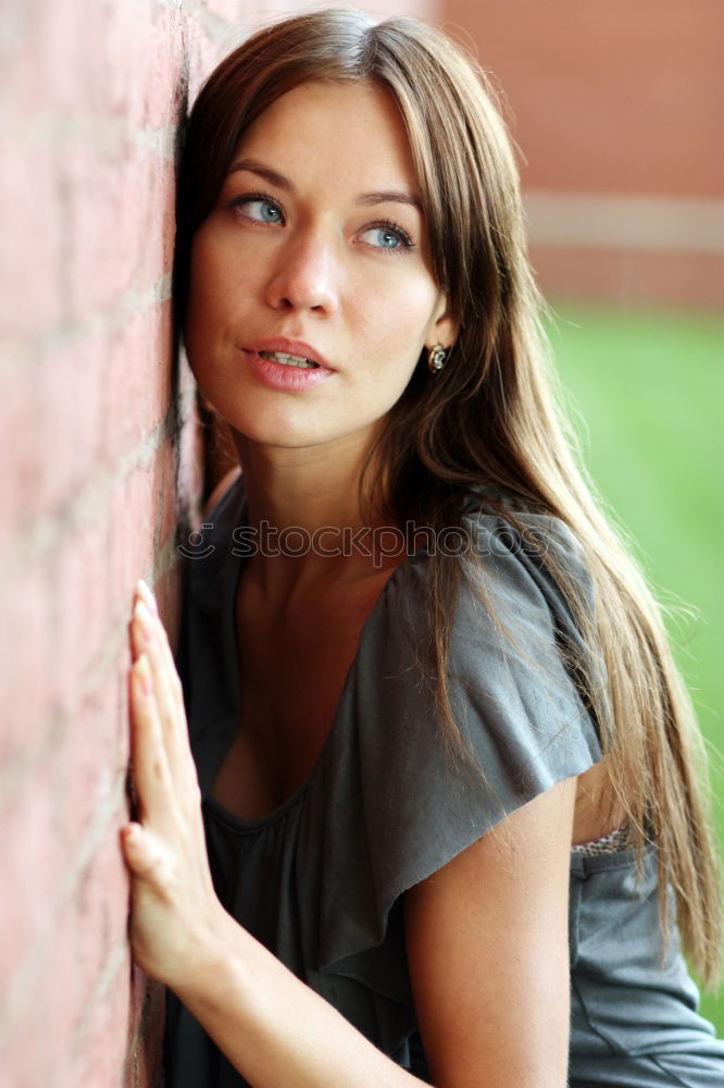 Similar – Attractive woman looking into store window