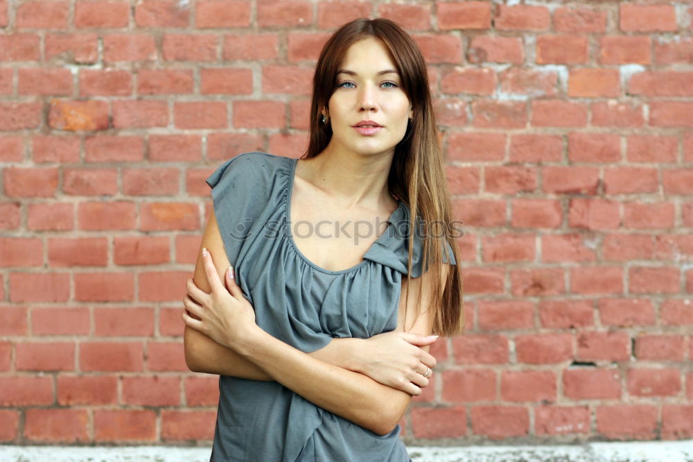 Similar – A young girl sits thoughtfully in a pink shopping trolley amidst pink goods