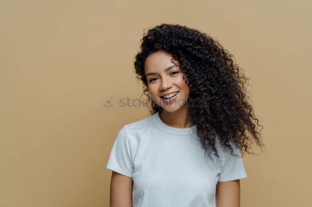 Similar – Young black woman, afro hairstyle, smiling outdoors