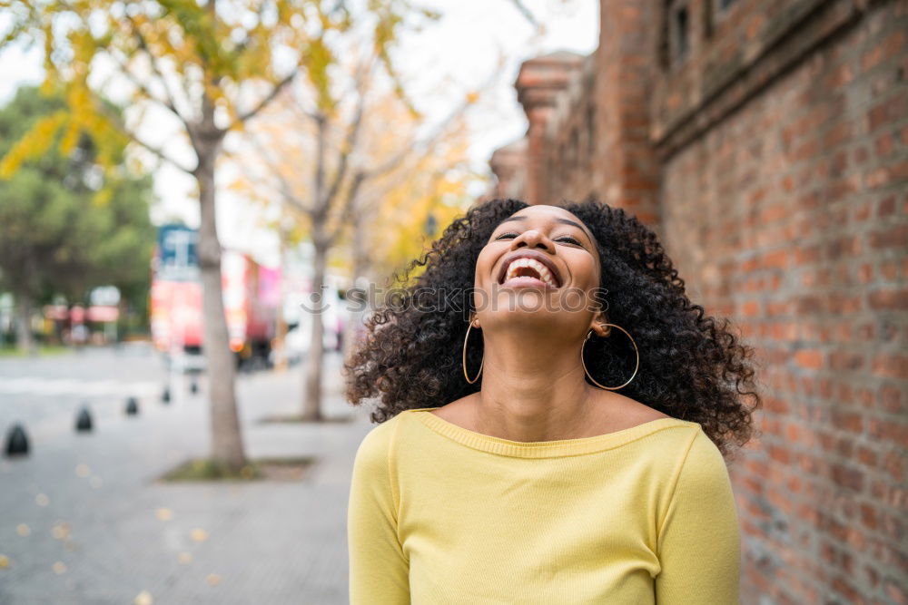 Similar – Image, Stock Photo Young black woman on the mobile phone near the royal palace in winter